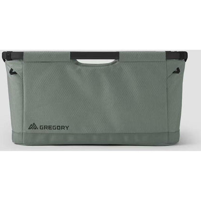 Back view of the Gregory Alpaca Gear Basket 70 in Nomad Green showing the top handle and logo against a white background.