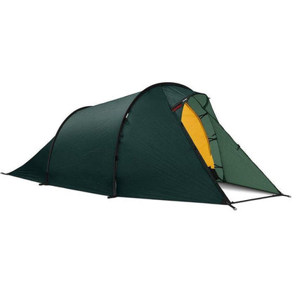 A side view of the Hilleberg Nallo 3 green tent showing the yellow interior against a white background.