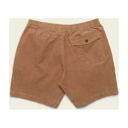 Back view of the Howler Brothers Men's Pressure Drop Cord Shorts in Lichen Green showing the back pocket and elastic waistband against a light background.