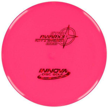 A pink Innova Disc Golf Star Aviar X3 disc golf disc with the Innova logo and a compass design on it.