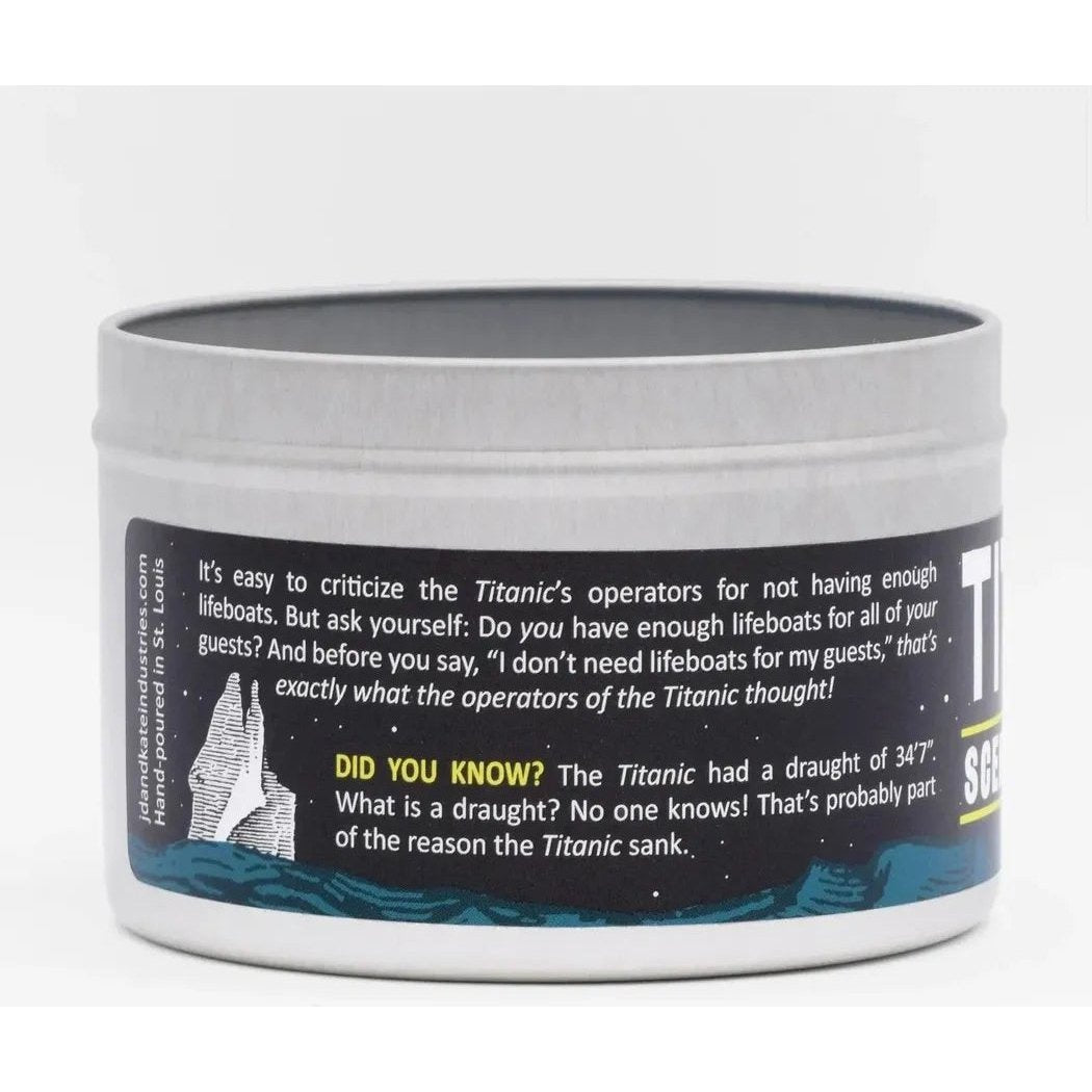A silver canister of the JD and Kate Industries Titanic Scented Candle sits against a plain white background with text about the Titanic on its label.