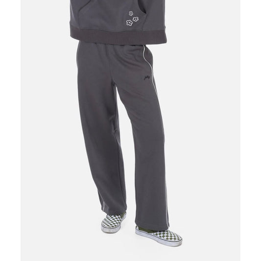 Front view of the Jetty Womens Grace Lounge Pants in Charcoal showing a model wearing them with checkered shoes against a white background.