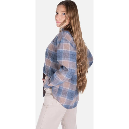 Side view of the Jetty Womens Wander Flannel in Brown showing a model wearing it against a white background.