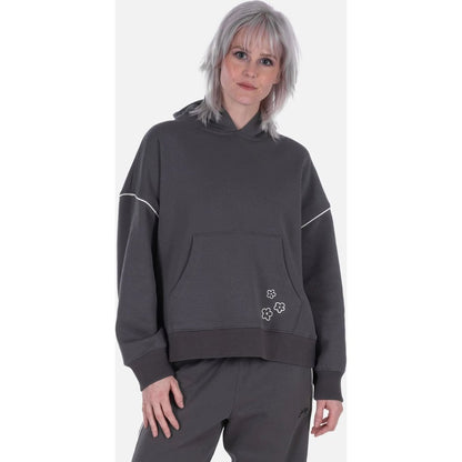 Front view of the Jetty Womens Wren Hoodie in Charcoal with a model wearing it against a white background.