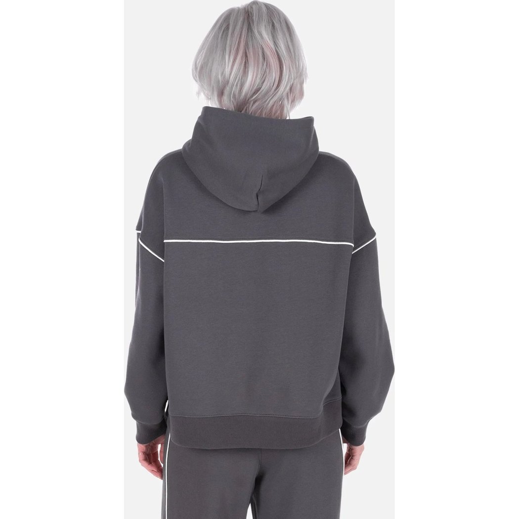 Back view of the Jetty Womens Wren Hoodie in Charcoal on a model with short gray hair against a white background.