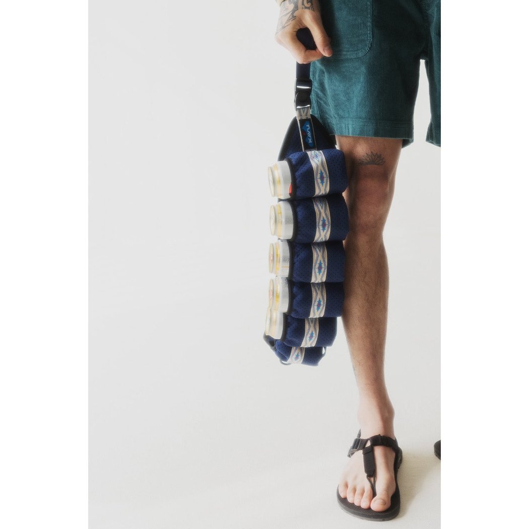 Side view of the Kavu Beer Buddy in Park Lines showing a model holding it with a white background.