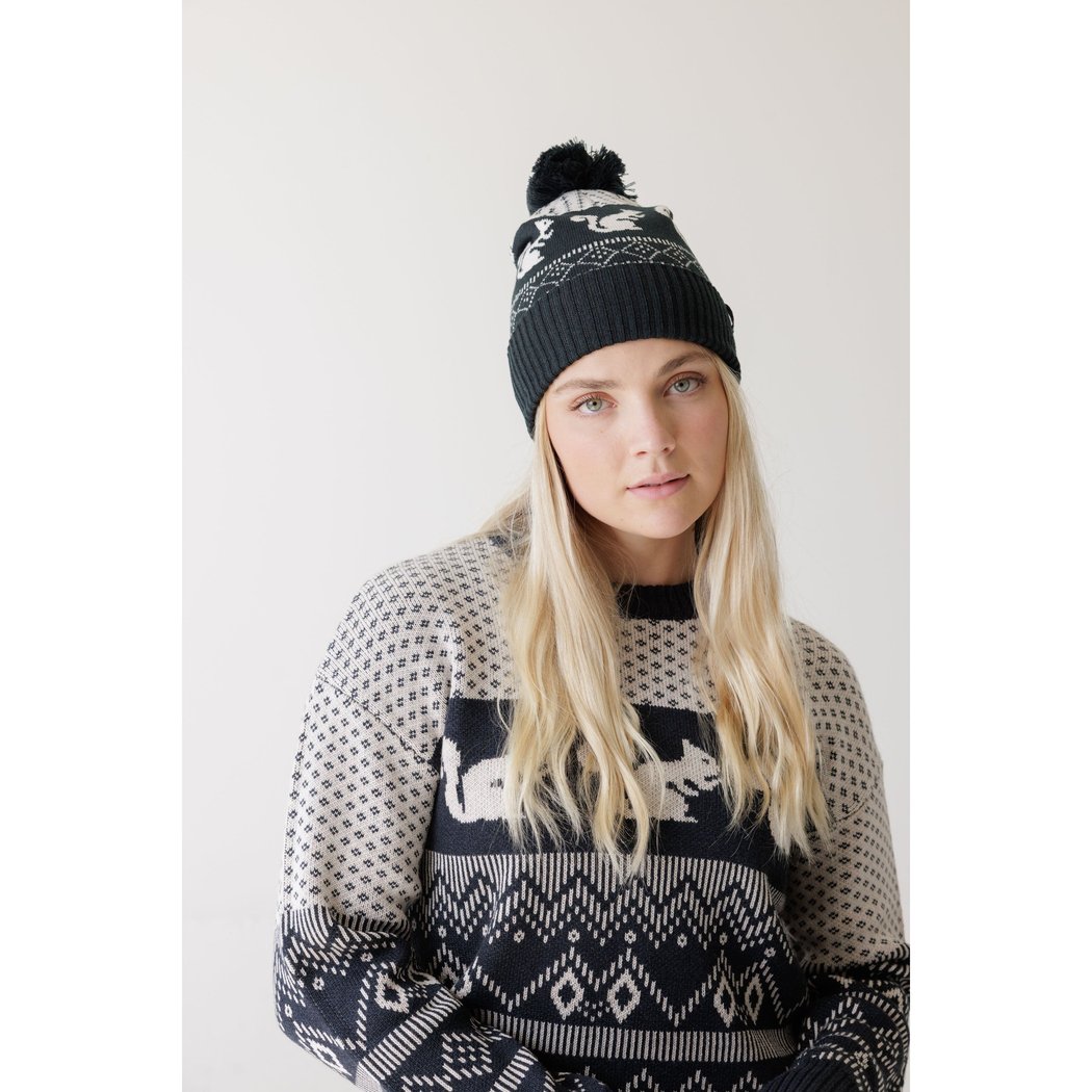 Front view of the Kavu Herschel in Squirrely showing a model wearing it against a white background.
