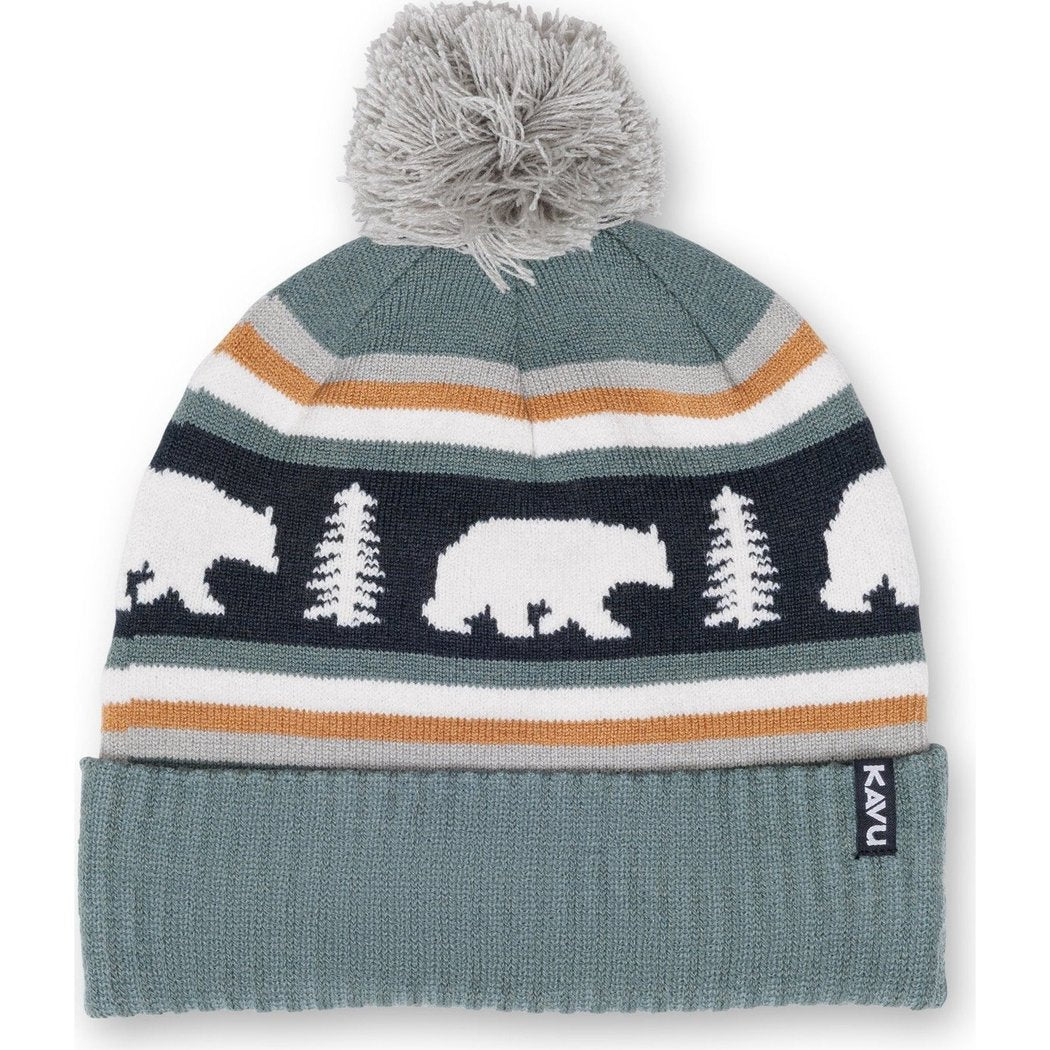 Front view of the Kavu Herschel in Squirrely showing the pom pom and bear/tree pattern against a white background.
