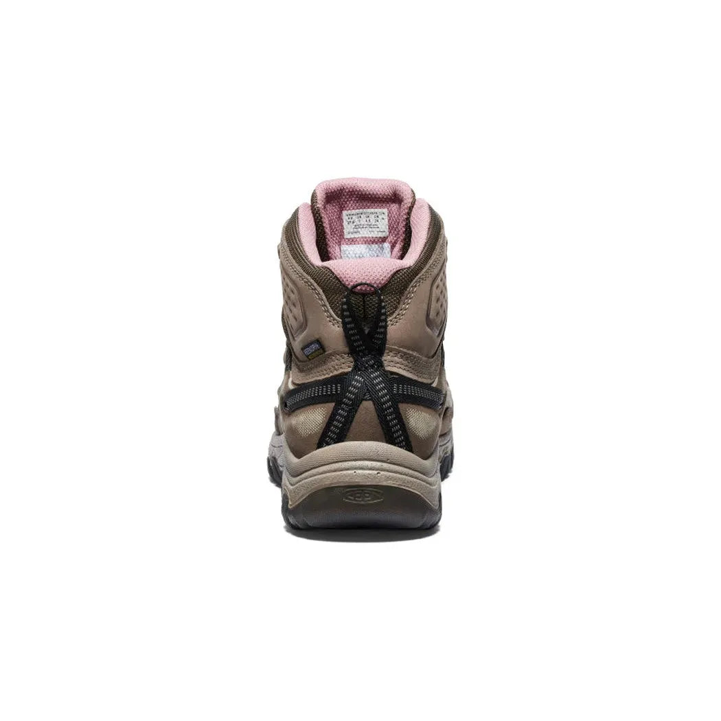 Back view of the Keen Women's Targhee IV Waterproof Hiking Boot in Brindle/Nostalgia Rose with a pink interior and black lacing system against a white background.