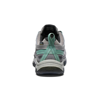 Back view of the Keen Women's Targhee IV Waterproof Hiking Shoe in Alloy/Granite Green showing the heel strap and white background.