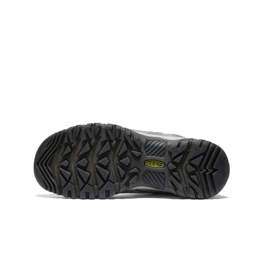 The sole of the Keen Women's Targhee IV Waterproof Hiking Shoe in Alloy/Granite Green is shown from below against a white background.