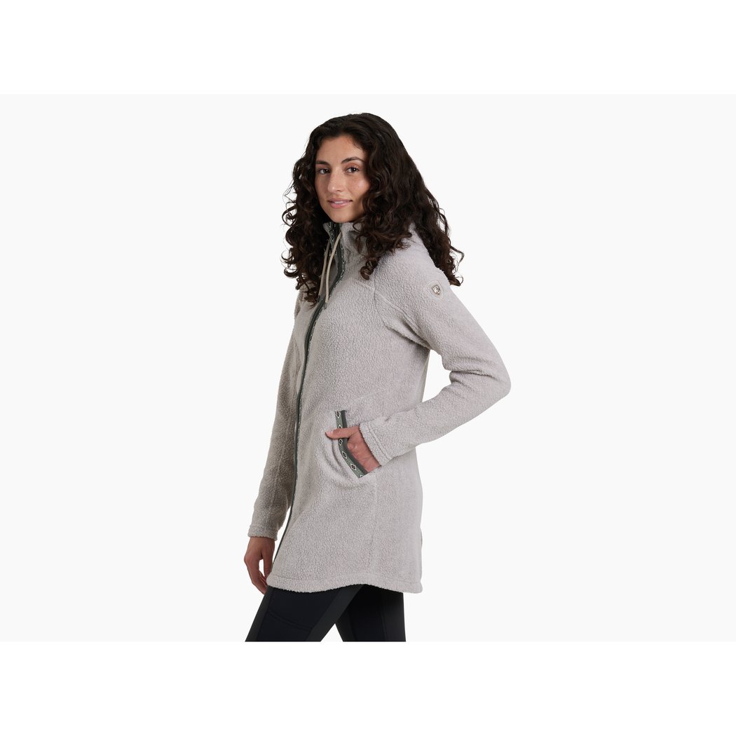 Side view of the Kuhl Hygge™ Long in NATURAL with a model wearing it against a white background.