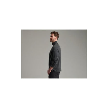 Side view of the Kuhl Mens Influx 1/4 Zip in Carbon showing a model wearing it against a gray background.