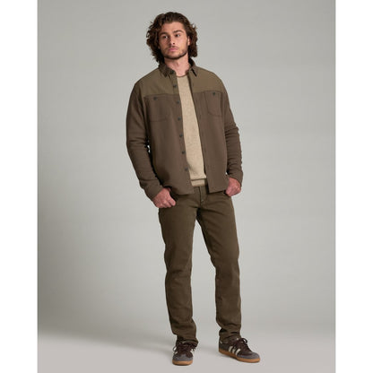 Front view of the Kuhl Relentr™ Shirt-Jac in Kanteen on a man standing against a gray background.