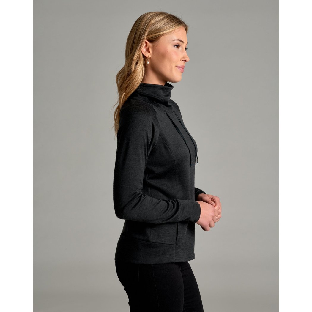 Side view of the Kuhl Women's Elia Pullover in Coffee showing the model wearing it against a gray background.