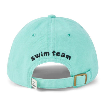 Back view of the Life is Good Kids Shark Floaty Swim Kids Chill Cap in Aqua Blue showing the adjustable strap and "swim team" text on the back.