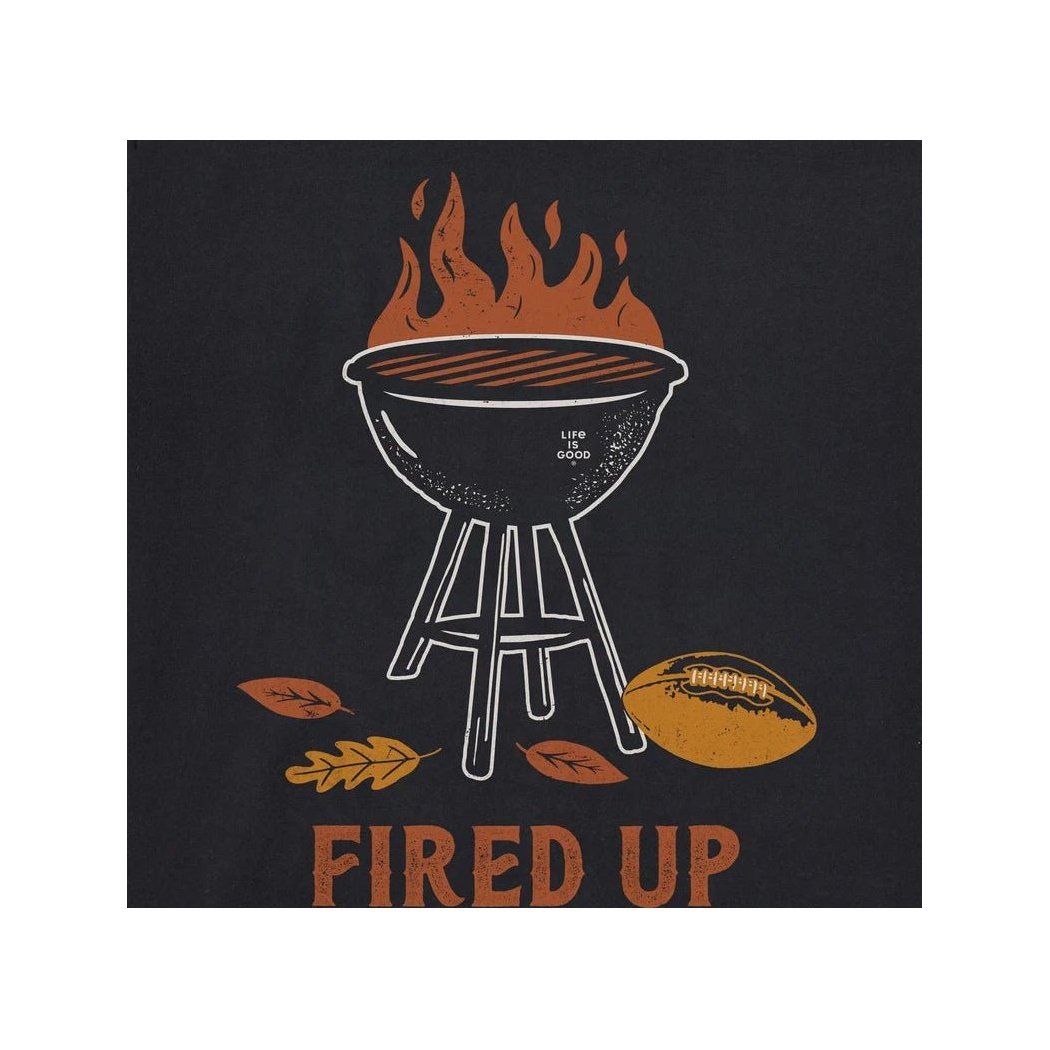 A black Crusher Tee with a grill, football, and "Fired Up" text on it.