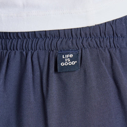 A close-up of the Life is Good Women's Solid Breezy Wide Leg Pant in Inkwell Blue showing the elastic waistband and brand tag.
