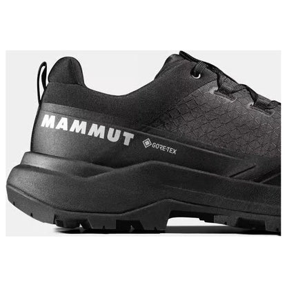 Side view of the Mammut Sertig III Low GTX Men shoe in Gabbro Strata showing the lugged outsole against a white background.