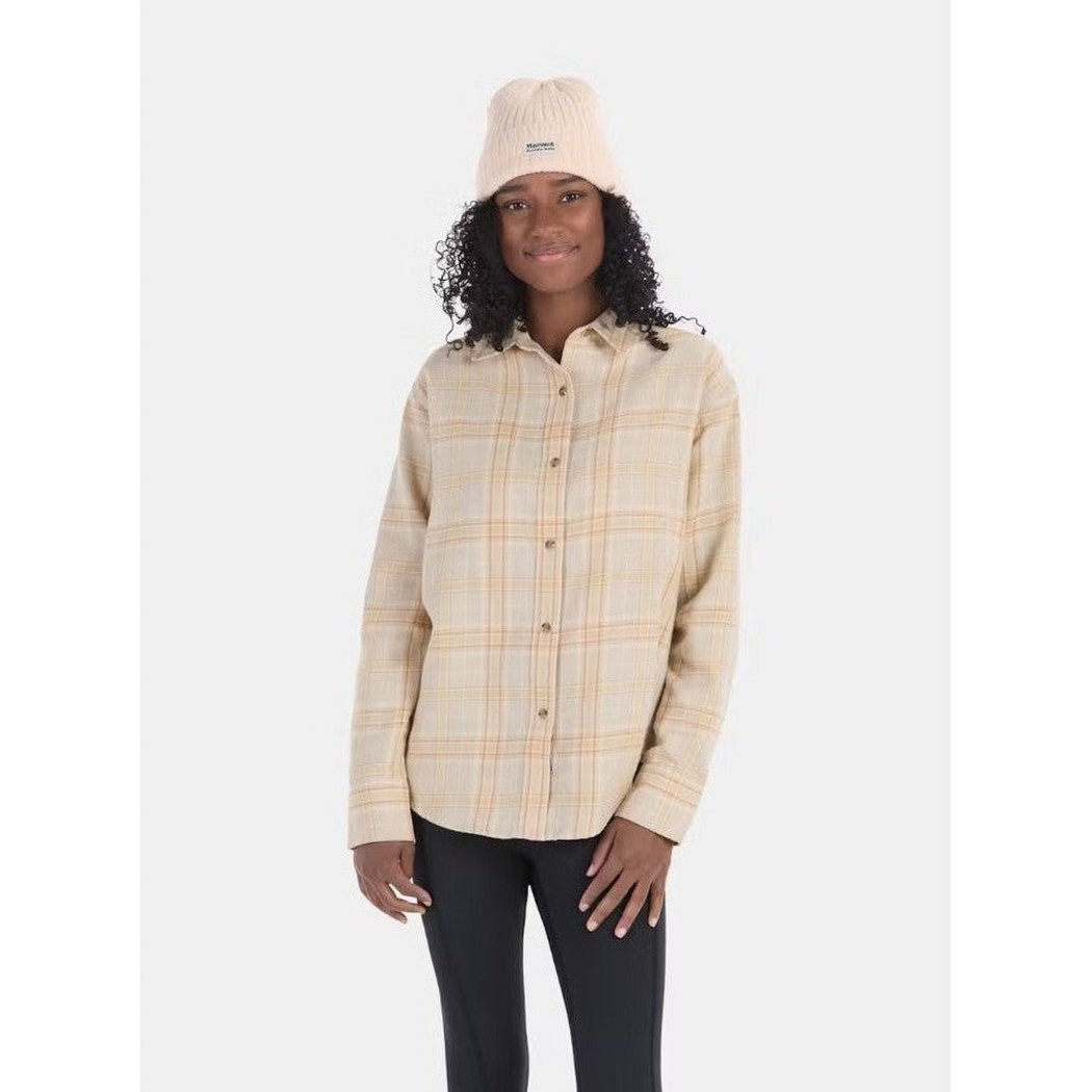 A woman wearing the Marmot Women's Fairfax Novelty Lightweight Flannel Long Sleeve in Auburn stands against a plain white background.