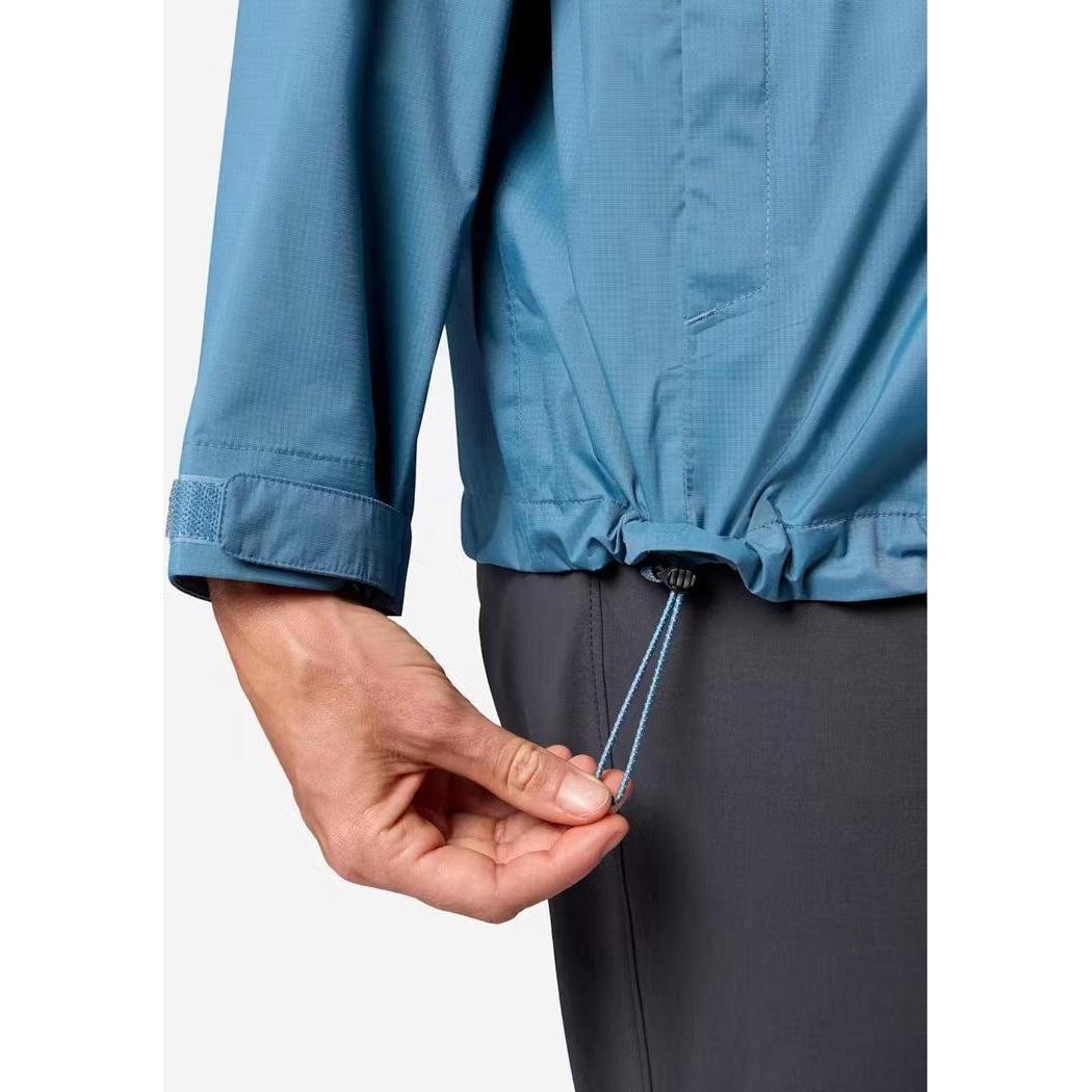 A close-up of the Marmot Women's PreCip Evo Jacket in Summer Storm showing the adjustable hem cord and a model wearing it against a plain background.