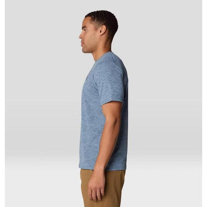 Side view of the Mountain Hardwear Men's Sunblocker Short Sleeve in Adriatic Blue Heather on a model against a light background.