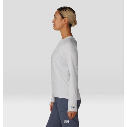Side view of the Mountain Hardwear Women's Crater Lake Long Sleeve in Fogbank showing the model wearing it against a light background.