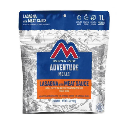 A front view of the Mountain House Lasagna with Meat Sauce backpacking meal package showing the mountain illustration background and 11g protein label.