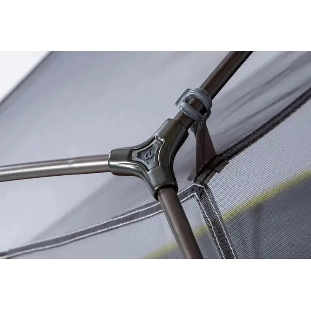 A close-up of the NEMO Dagger OSMO Lightweight Backpacking 2p Tent showing the metal joint and mesh fabric.