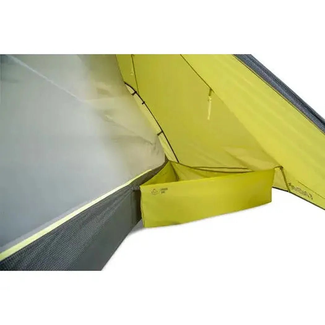 The interior of the NEMO Dagger OSMO Lightweight Backpacking 2p Tent shows a yellow storage pocket and mesh floor against a white background.