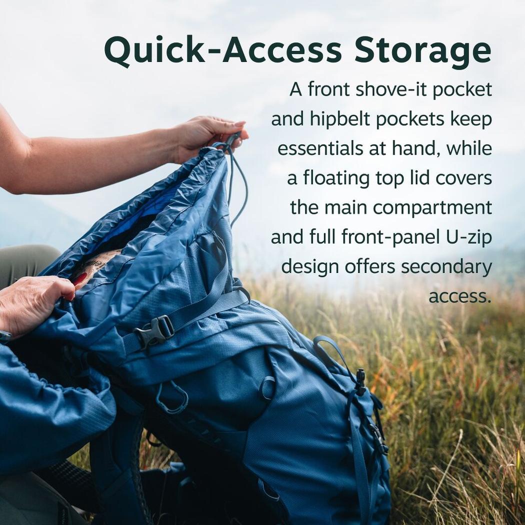 A person opens the front of the Moss Green Osprey Kestrel LT 65 backpack in a grassy outdoor setting.