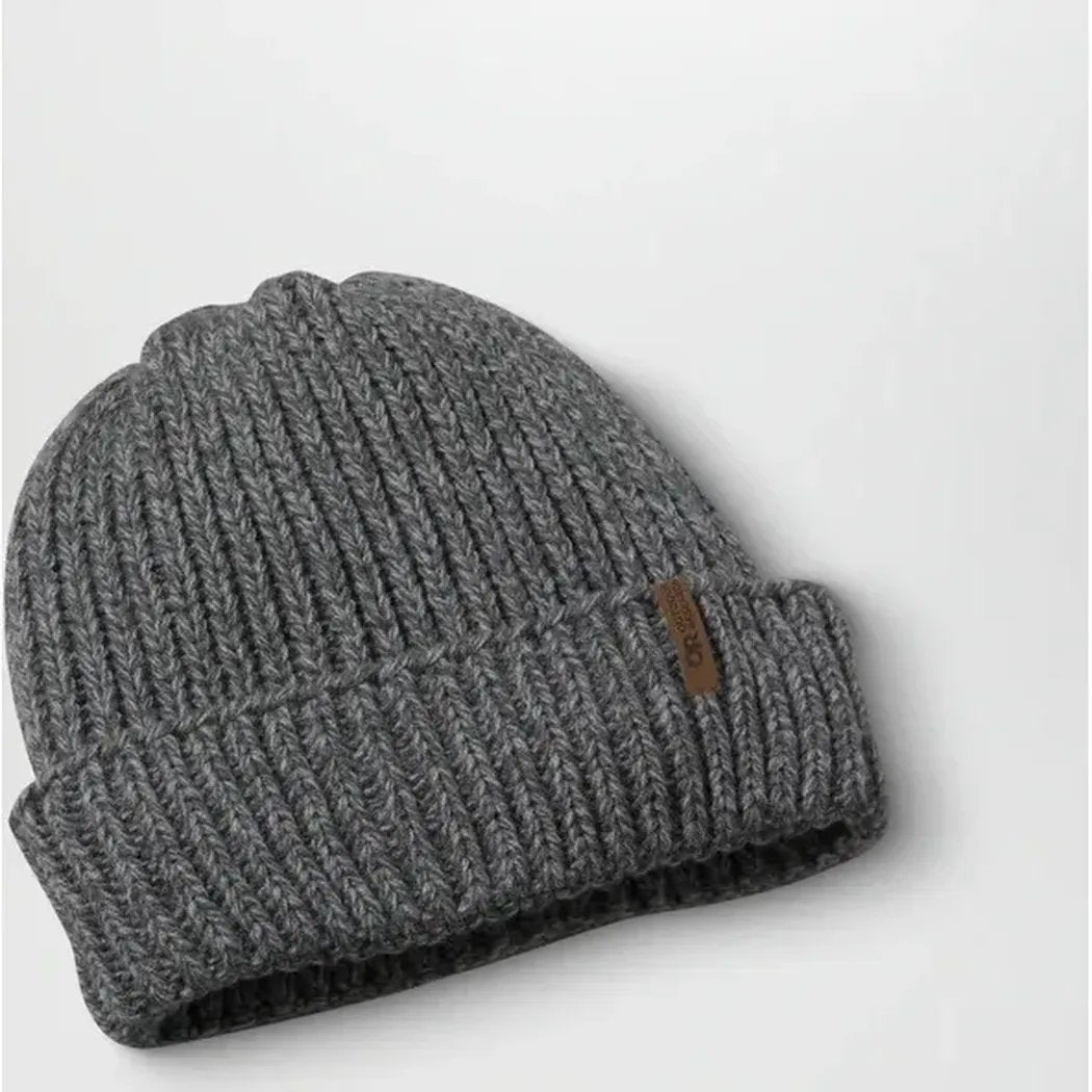A charcoal Outdoor Research Lift ie VX Beanie with a leather tag, shown from a top-down angle on a white background.