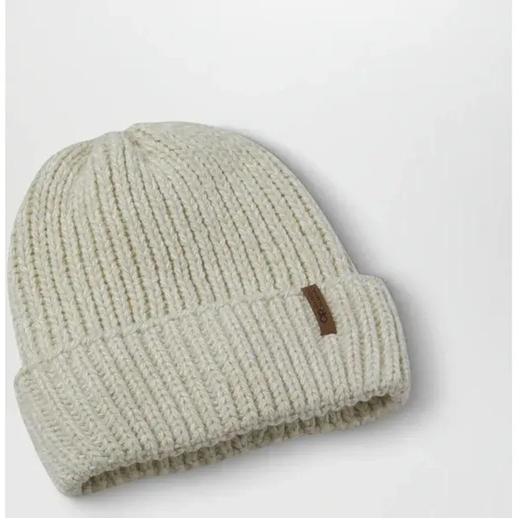 A front view of the Outdoor Research Lift ie VX Beanie in Charcoal with a brown tag on the cuff against a white background.
