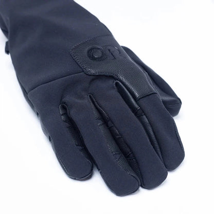 A close-up of the Outdoor Research Men's Stormtracker Sensor Windbloc Gloves in Black, showing the leather detail on the wrist and a white background.