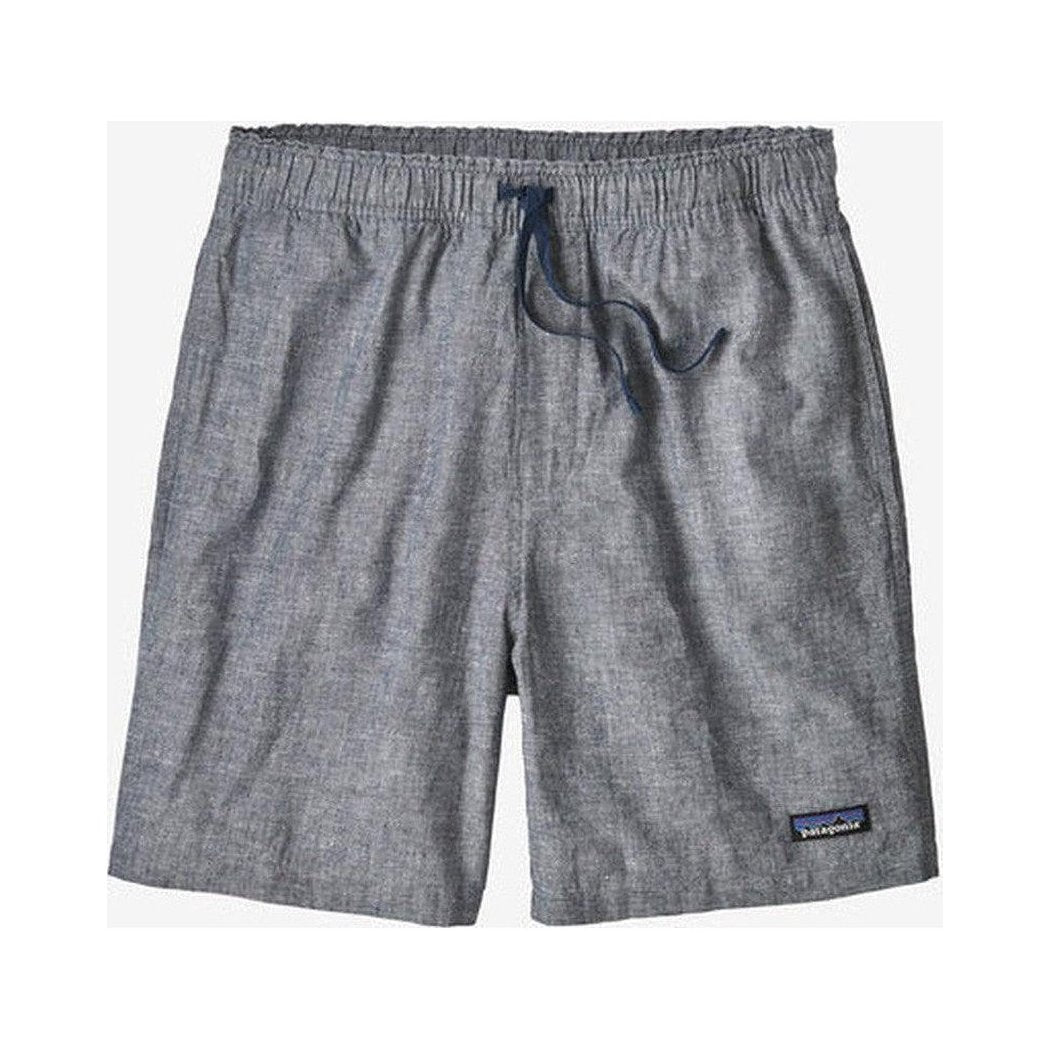 Side view of the Patagonia Men's Baggies Naturals in Feather Grey showing the drawstring waist and small logo tag on the lower right leg.