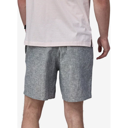 Back view of the Patagonia Men's Baggies Naturals in Chambray: Feather Grey on a model against a white background.