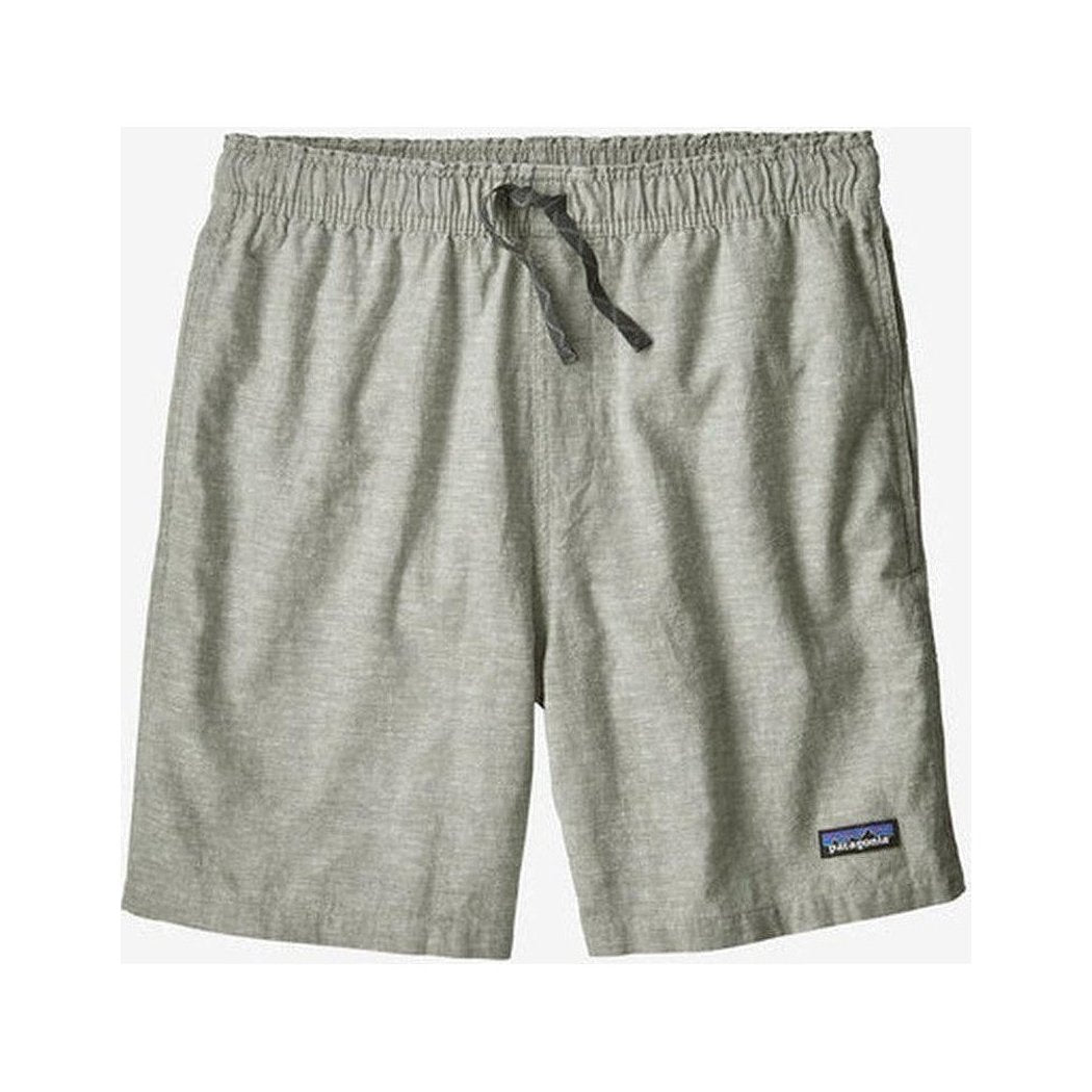 Side view of the Patagonia Men's Baggies Naturals in Feather Grey showing the drawstring waist and the brand patch on the lower right.