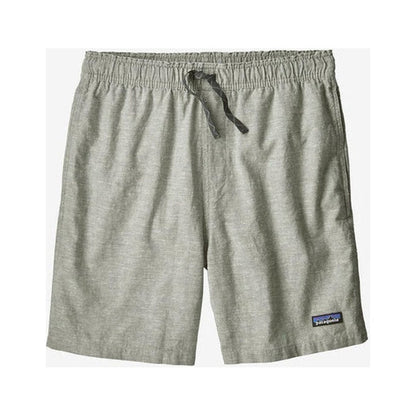 Side view of the Patagonia Men's Baggies Naturals in Feather Grey showing the drawstring waist and the brand patch on the lower right.