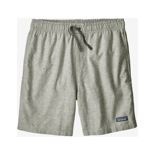 Side view of the Patagonia Men's Baggies Naturals in Feather Grey showing the drawstring waist and the brand patch on the lower right.