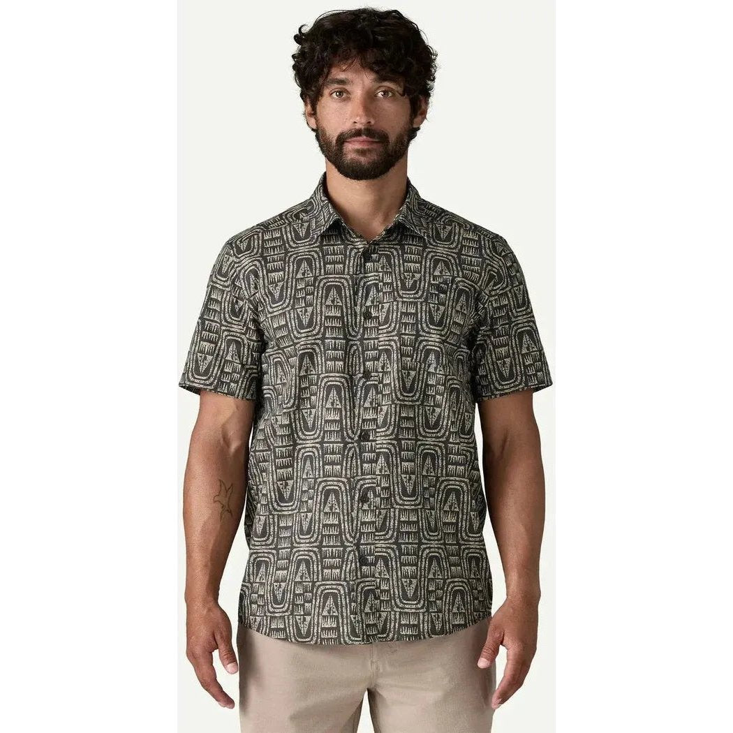 A front view of the Patagonia Men's Go To Shirt in Flow: Sunken Blue on a model wearing khaki pants against a white background.