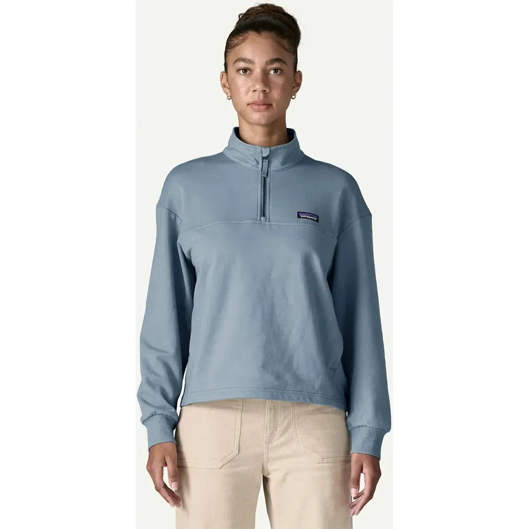 A front view of the Patagonia Women's Ahnya P/O in Basin Green showing the half-zip collar and model wearing it against a plain background.