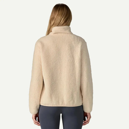 Back view of the Patagonia Women's Los Gatos 1/4 Zip in Natural on a model wearing dark pants against a plain background.