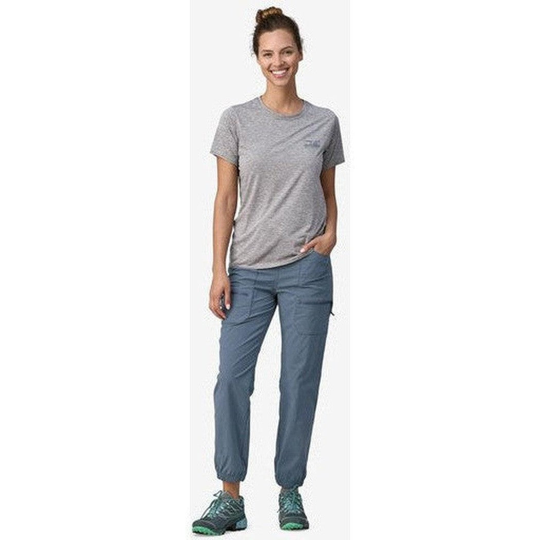 A woman wearing Patagonia Women's Quandary Joggers in Forge Grey stands against a white background.