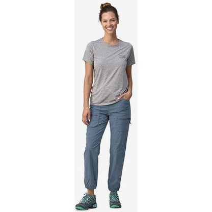 A woman wearing Patagonia Women's Quandary Joggers in Forge Grey stands against a white background.