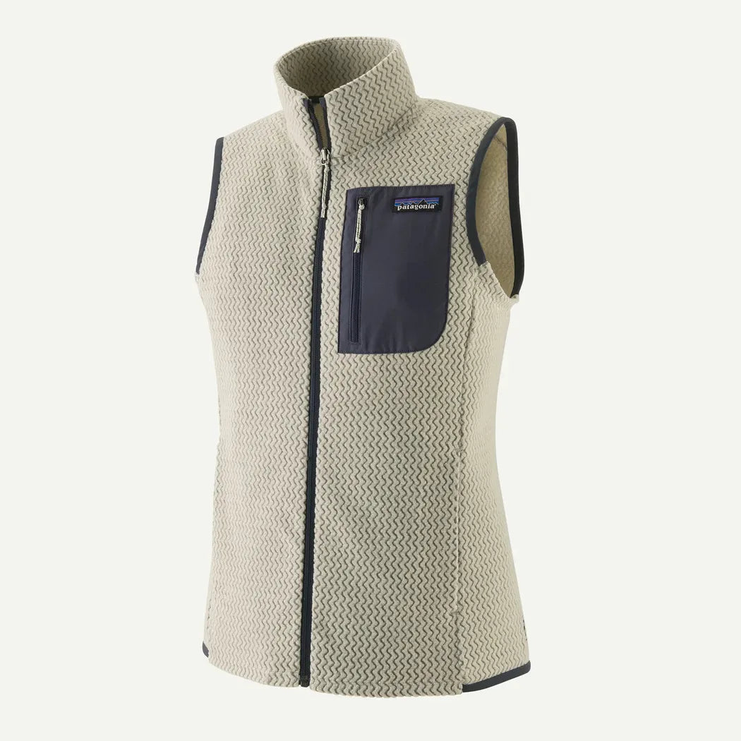A front view of the Patagonia Women's R1 Air Vest in Wool White with a dark pocket and zipper against a white background.