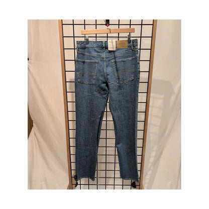 Back view of the Prana Mens Carlsbad 760 Slim Jeans-SAMPLE in Sea Salt/32 hanging on a grid display.