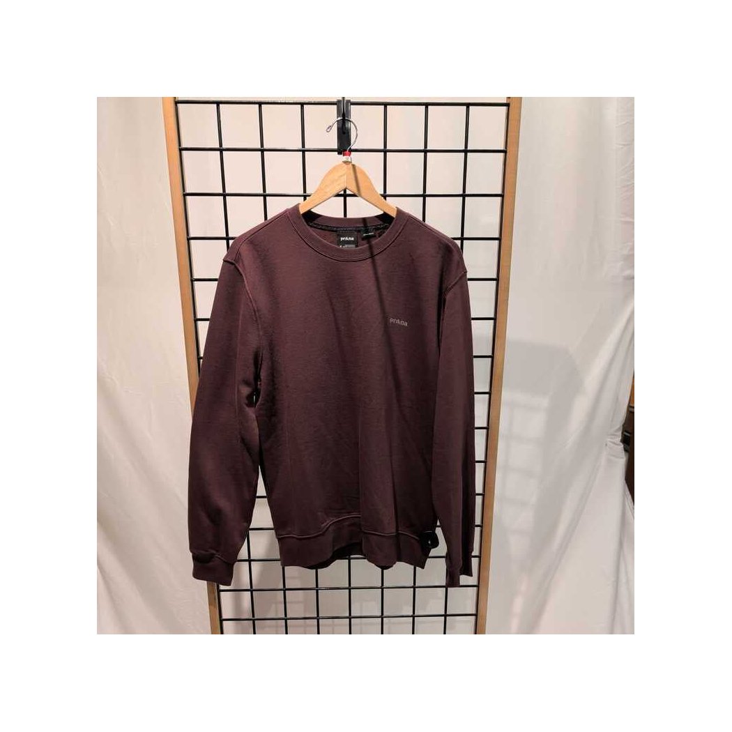 Front view of the Prana Mens Everyday Crew Sweatshirt-SAMPLE in DeepVino hanging on a wooden hanger against a grid backdrop.