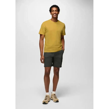 A model wearing the Prana Men's Everyday Short Sleeve Tee in Pollen stands against a plain white background.