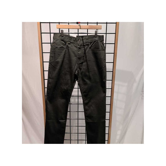 Front view of the Prana Mens Palisades Ripstop Chino Pant-SAMPLE in Nori/32 hanging on a wooden hanger against a grid background.