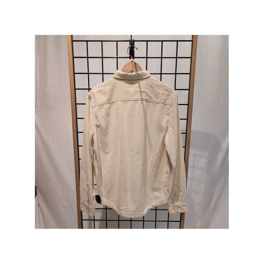 Back view of the Prana Mens Ridgecrest Long Sleeve-SAMPLE in Canvas hanging on a grid display with a wooden frame.